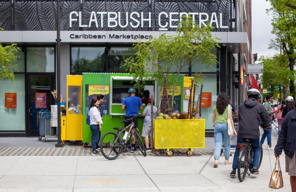Shoppers outside the Flatbush Central Caribbean Marketplace