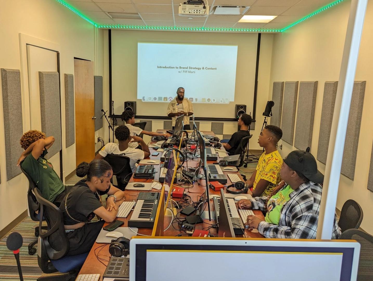 Fellows at a music production workshop